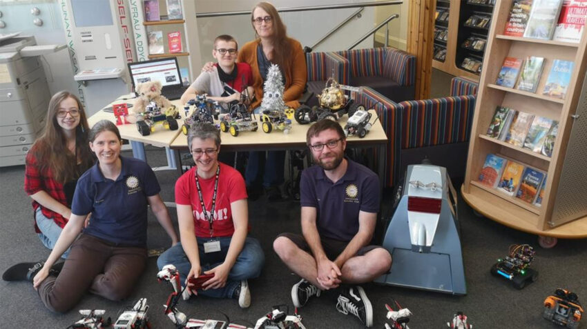 Emma Chantelle at Aberystwyth Library 2022, with The Intelligent Robotics Group from Aberystwyth University